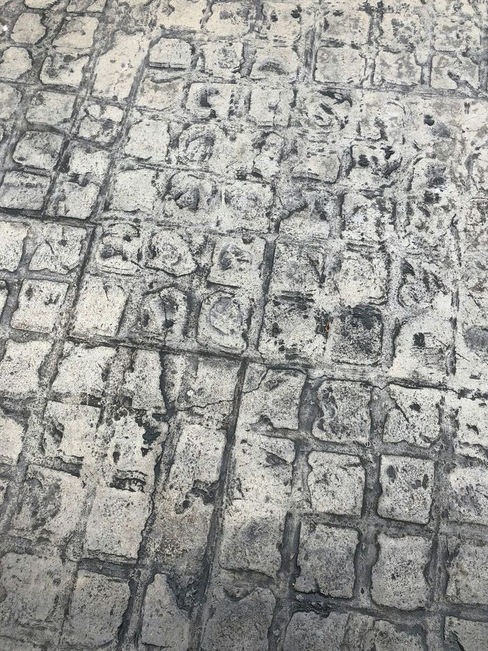 Grey concrete with a cobble-style pattern